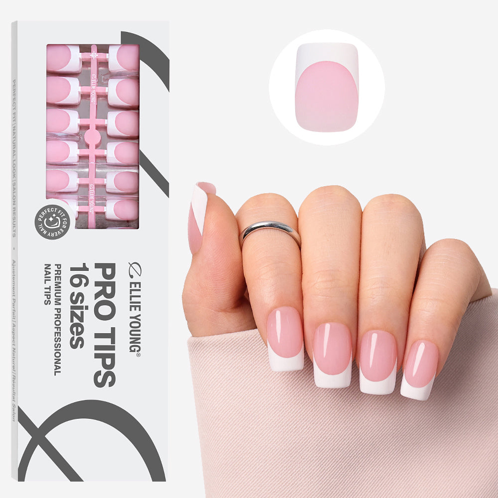 Medium square nails featuring a soft pink base and white French tips