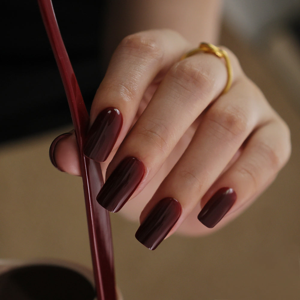 Detail view of The Red Edit medium square nails