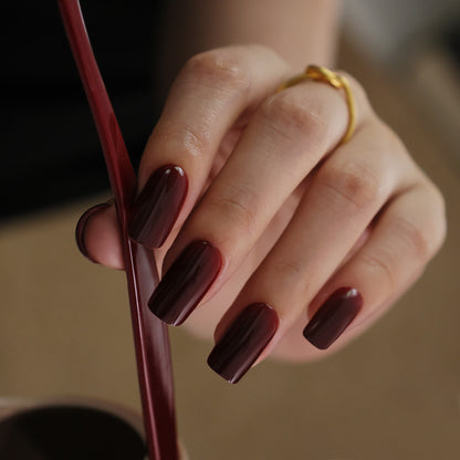 Detail view of The Red Edit medium square nails